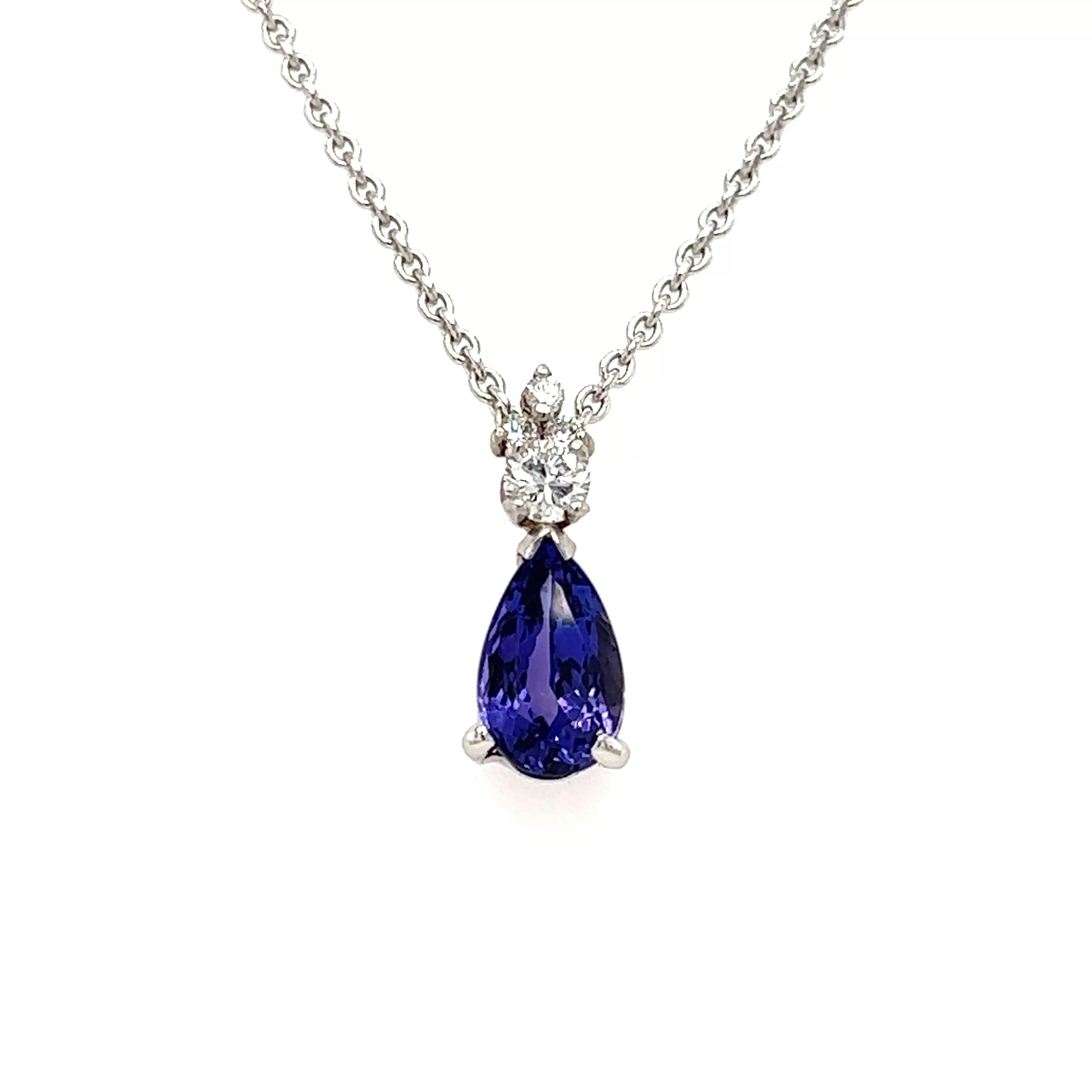 Pear Tanzanite Pendant with Four Diamonds in Platinum and 14K White Gold