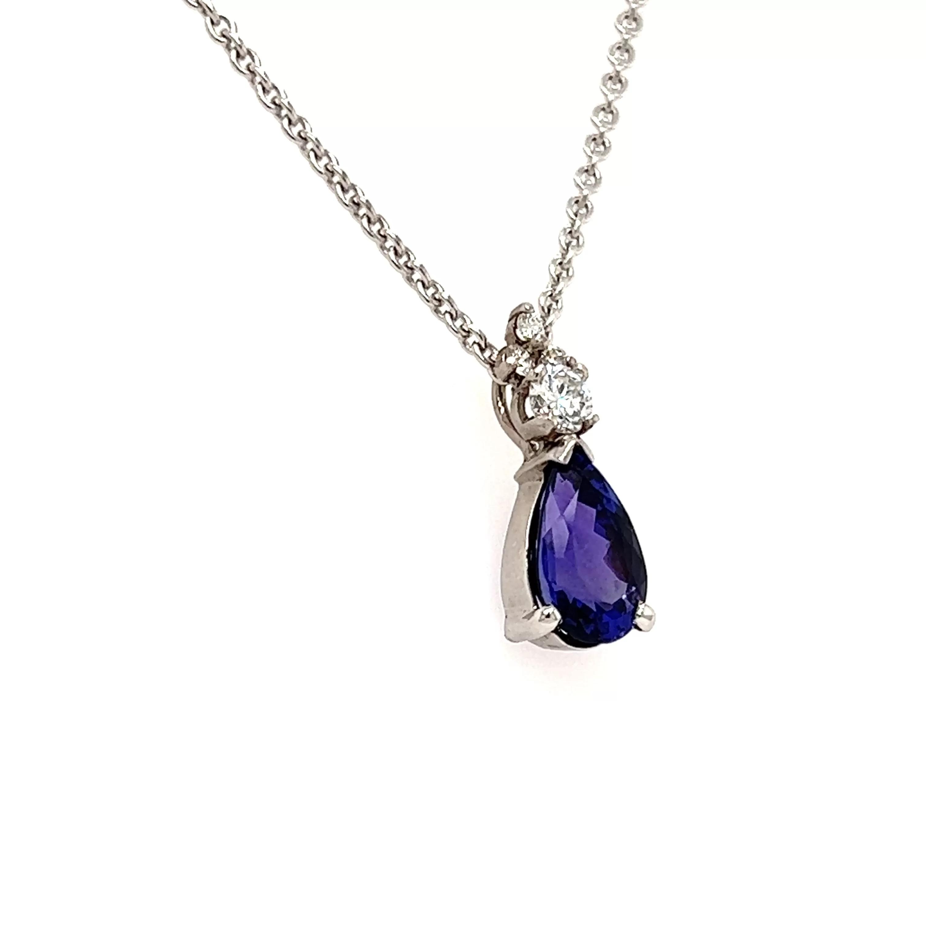 Pear Tanzanite Pendant with Four Diamonds in Platinum and 14K White Gold